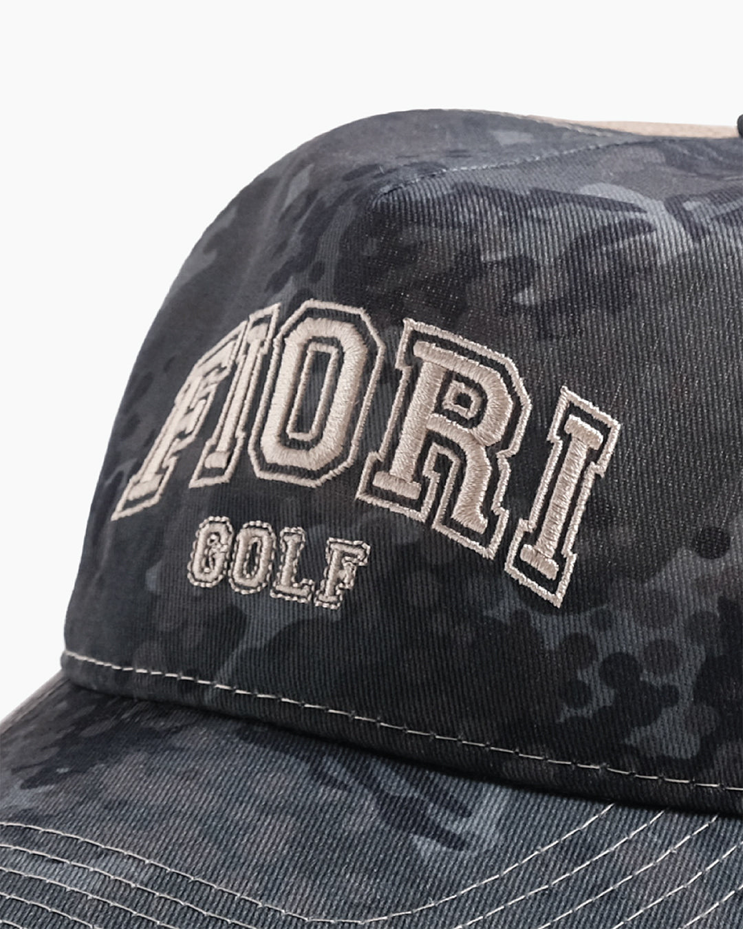 Calyx Trucker Hat close-up — custom camo flower design detail by Fiori Golf